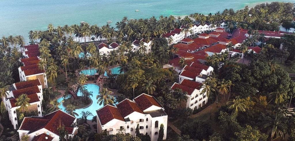 Birds-eye view of the hotel and coastline